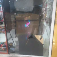 شیشه سکوریت برا دکور مغازه درب مغازه