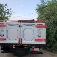 اتاق چوبی فلزی و تریلی تراکتور