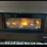 بخاری گاز سوز نیک کالا طرح شومینه|بخاری، هیتر، شومینه|تهران, شهرک دریا|دیوار