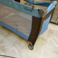 تخت بازی کودک و اسکوتر برقی کودک