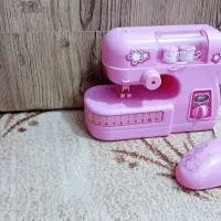 اسکوتر و چرخ خیاطی . عروسک چرخشی السا