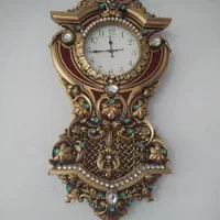 ساعت دیواری رنگ طلایی