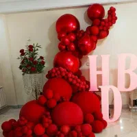 دیزاین بادکنک گل شمع آرایی افتتاحیه کافه رستوران