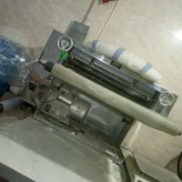دستگاه پهن کن و خمیر گیر