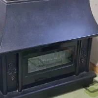 بخاری گازی طرح شومینه بزرگ شیک سالم و در حد نو