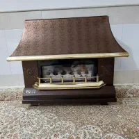 بخاری گاز سوز طرح شومینه