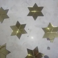 ستاره با اینه طلایی جهت سیسمونی سقف اتاق کودک