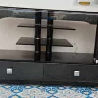 میز تلویزیون سالم شیشه‌ای بدون خطو خش