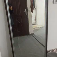 آینه با قاب چوبی