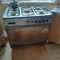 فرش و میز غذا خوری و یخچال و غیره ...