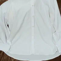 تعدادی لباس|لباس|بندر انزلی, نوغان|دیوار