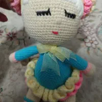 عروسک بافتنی.