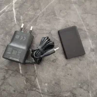 یک عدد باتری و شارژر گوشی نوکیا
