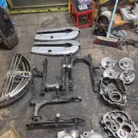 لوازم هوندا 125 اگزوز هوندا کمک عقب هوندا زین