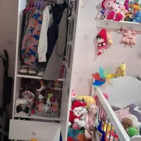 تخت کودک همراه با کمد