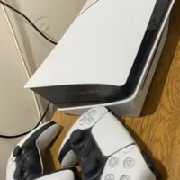 ps5اسلیم دیسک خور همراه دو سته و بازی