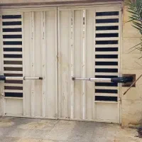 تعمیرات جک درب  ریموتی پارکینگ برقی بازویی ریلی