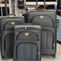 چمدان برزنتی خارجی دارای زیپ افزایشی و آستر خارجی