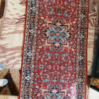 کنار فرش و میز تحریر