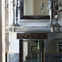 آینه شمعدان و میز‌تلویزیون