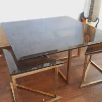 میز شیشه ای دودی با پایه طلایی