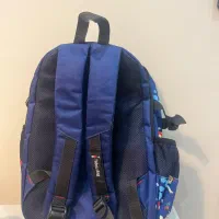 کیف مدرسه  و پرده