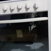 یک عدد اجاق گاز و تلوزیون و میزش ب فروش میرسد|اجاق گاز و لوازم برقی پخت‌وپز|حاجی آباد, |دیوار