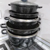 دو سرویس قابلمه یک سرویس نو و یک‌سرویس استفاده شده