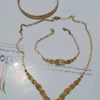 طلاها در حد نو نیم ست و النگو ۱۵۰ بالا خام