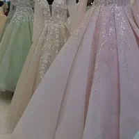 کرایه لباس مجلسی.وعروس. دخترانه مزون نجمه صمدی