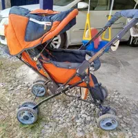 کالسکه . تخت . و کربر.کودک رنگ سورمه ای نارنجی.