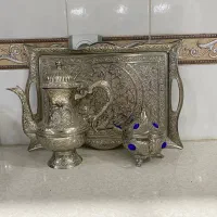 یک دست سینی،قندان،قهوه خوری استیل،۳ عدد ظرف برنجی