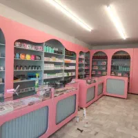 دکوراسیون داخلی مغازه قفسه میز پیشخان