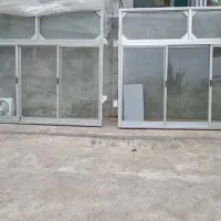 دو عدد پنجره آلومینیومی رلی همراه با شیشه