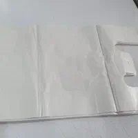 نایلون نایلکس شیری دسته دار و سفره یکبار مصرف