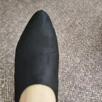 تعدادی کفش|کیف، کفش، کمربند|رشت, فلسطین|دیوار