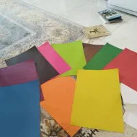 مقوا رنگی و دفترچه و مداد رنگی