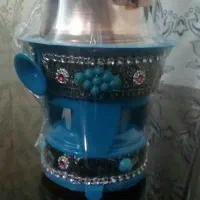 استا قدوس با دیگ مسی