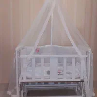 تخت وگهواره کنار تخت مادر تُرک