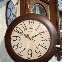 ساعت دیواری دوطرفه