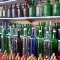 بطری شیشه ای ۱ لیتری|ظروف نگهدارنده، پلاستیکی، یک‌بارمصرف|اصفهان, باغ فدک|دیوار