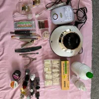 وسایل کاشت و ژلیش ناخن|آرایشگاه و سالن‌های زیبایی|شوط, |دیوار