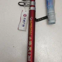 چوب و چرخ ماهیگیری نو با جعبه و کاور