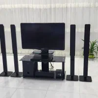 تلویزیون و سینمای خانواده فیلیپس با میز شیشه ست