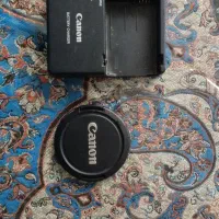 شارژر و کاور لنز ۱۸-۵۵ دوربین کنون 600D canon