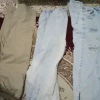 دو عدد شلوار لی و یک شرتک