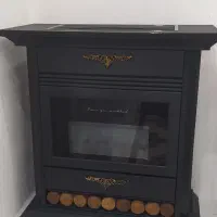 بخاری گازی طرح شومینه