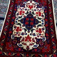 فرش دستبافت گل سرخ