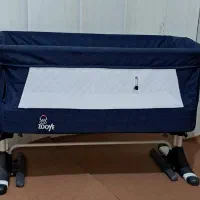 گهواره وتخت کنار مادر