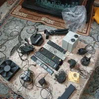 گوشی تلفن ومقداری شارژز